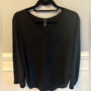 Wonderful condition Forever 21 Women's Black V-Neck Blouse. Size Medium.